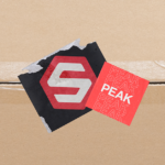 ShipHero and Peak Season Sticker on Cardboard Box