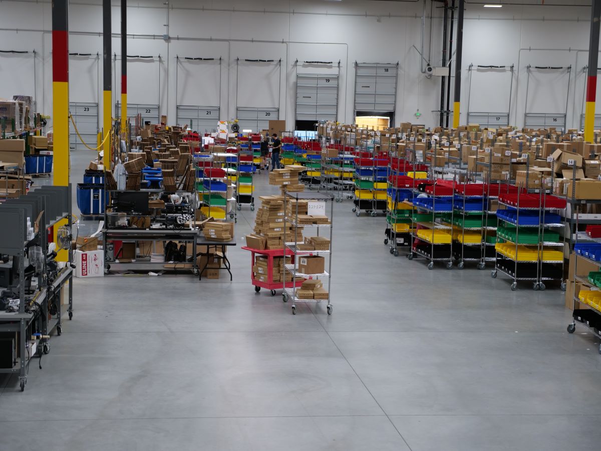 View of a warehouse with bins everywhere organized and ready to work