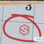 Photo of a calendar with the ShipHero logo circled on the calendar as a day.