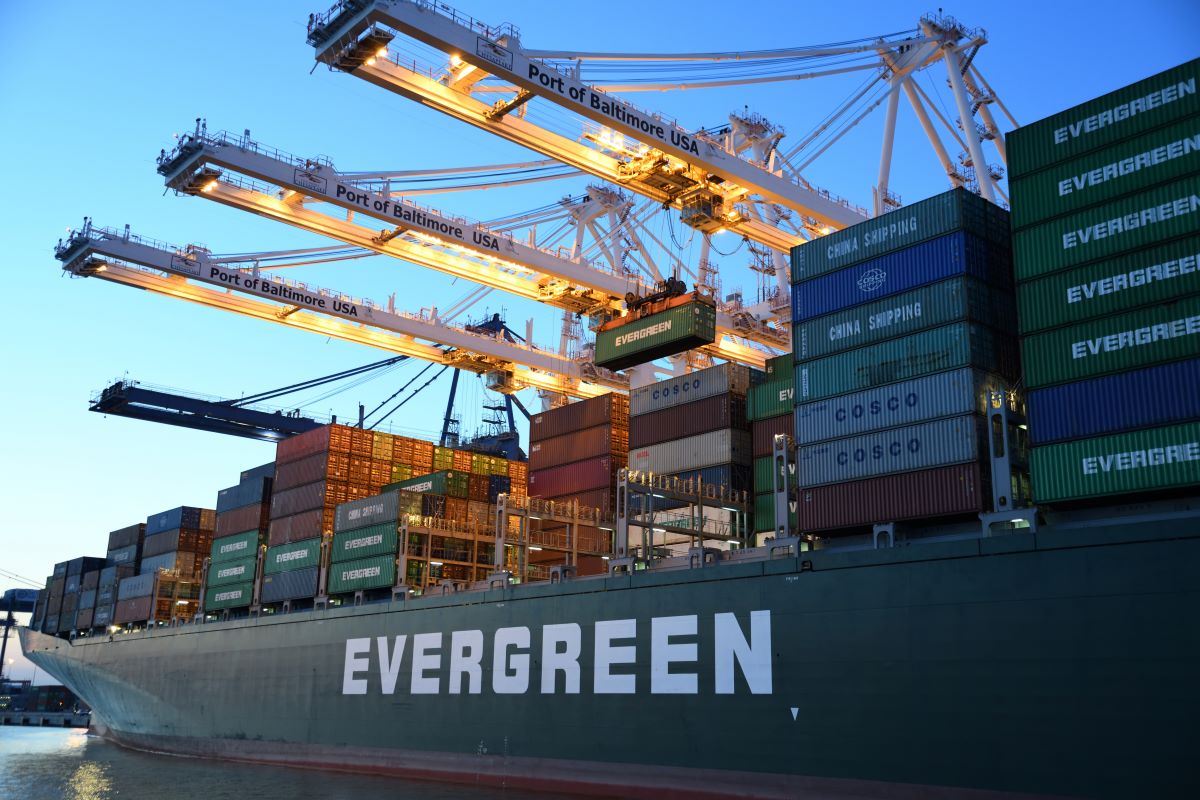 A shipping container boat being offloaded at the port of Baltimore